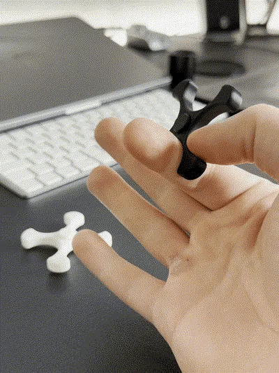 Finger flipping fidget spinner
